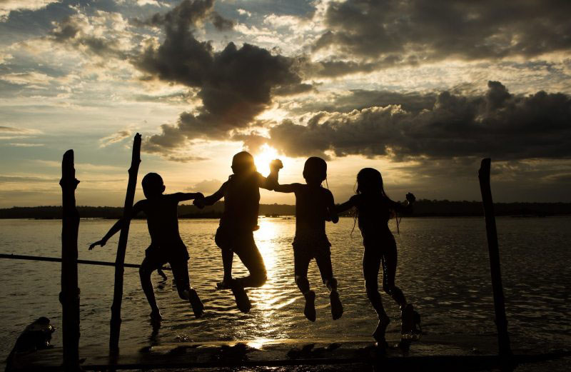 Munduruku Children Swimming in Tapajós River in the Amazon